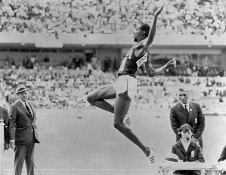 Bob Beamon flying to a long jump world record at the 1968 Olympic Games in Mexico (-)