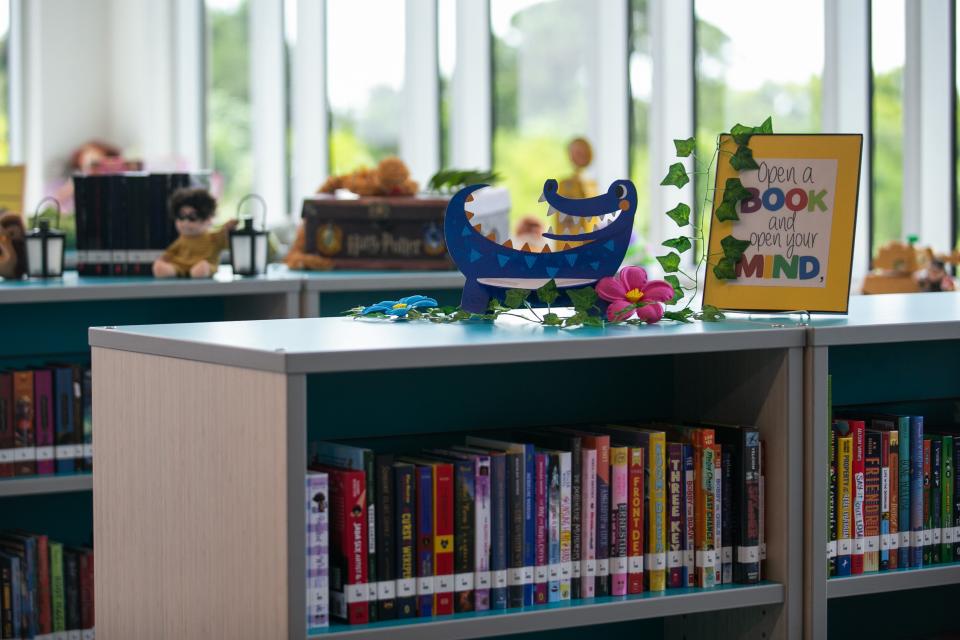 Shelves stocked with books t the Blue Lake Elementary School media center in Boca Raton. Blue Lake's library doesn't have any religious texts, according to a list provided by the Palm Beach County School District.