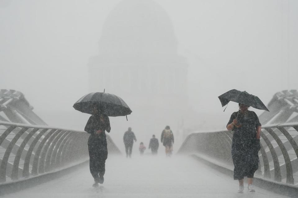 Londoners may need their umbrellas on Tuesday (Victoria Jones/PA) (PA Wire)