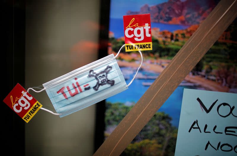 FILE PHOTO: TUI employees protest in front of the tour operator headquarters in Levallois-Perret