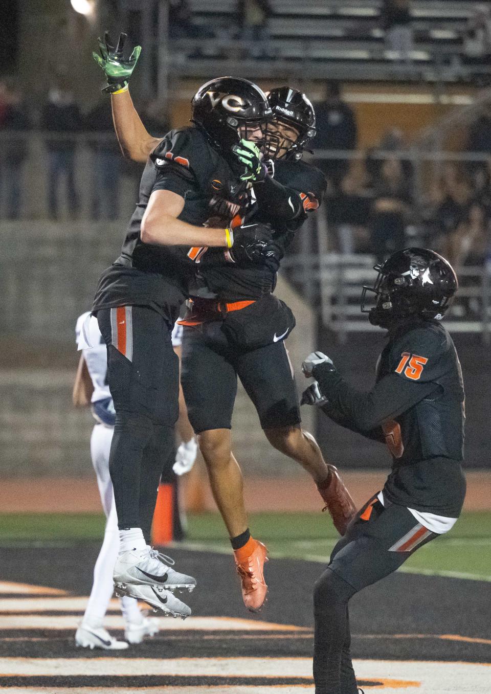 Ventura College receiver Tyler Woodworth celebrates his game-winning TD catch with teammate Eli Aragon after the Pirates took the lead over visiting El Camino College with 1:14 to play Saturday night at the VC Sportsplex.