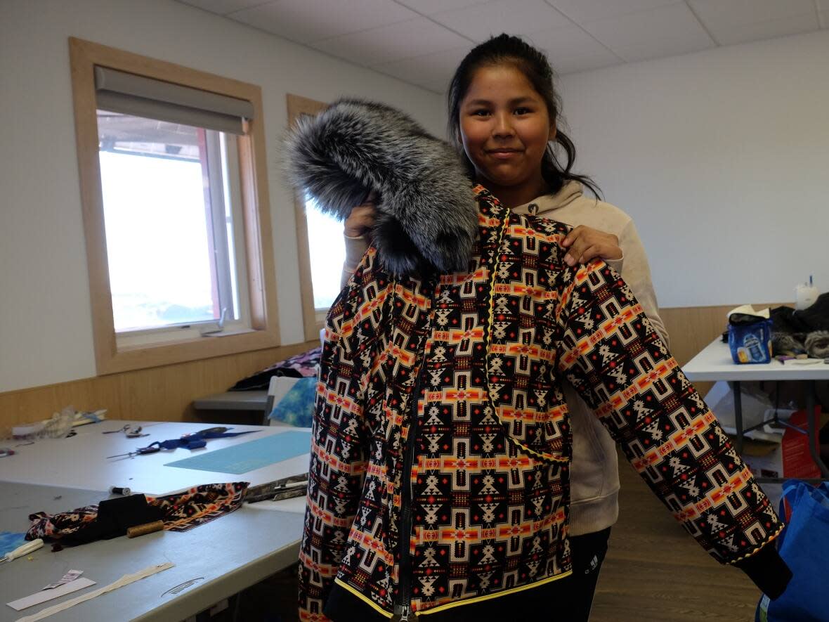 Hannah Beaulieu said she was proud to complete her parka and hopes more youth will come out to Come Sew With Auntie workshops. (Avery Zingel/CBC  - image credit)