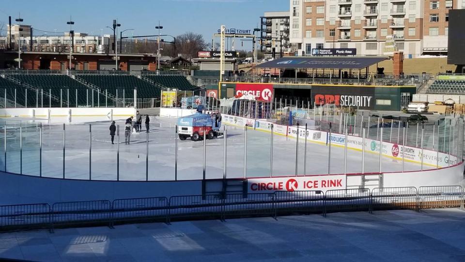 An outdoor hockey field is being prepared for a Jan. 13 game between the Charlotte Checkers and the Rochester Americans. The field owned by the Charlotte Knights baseball team is used for many events.