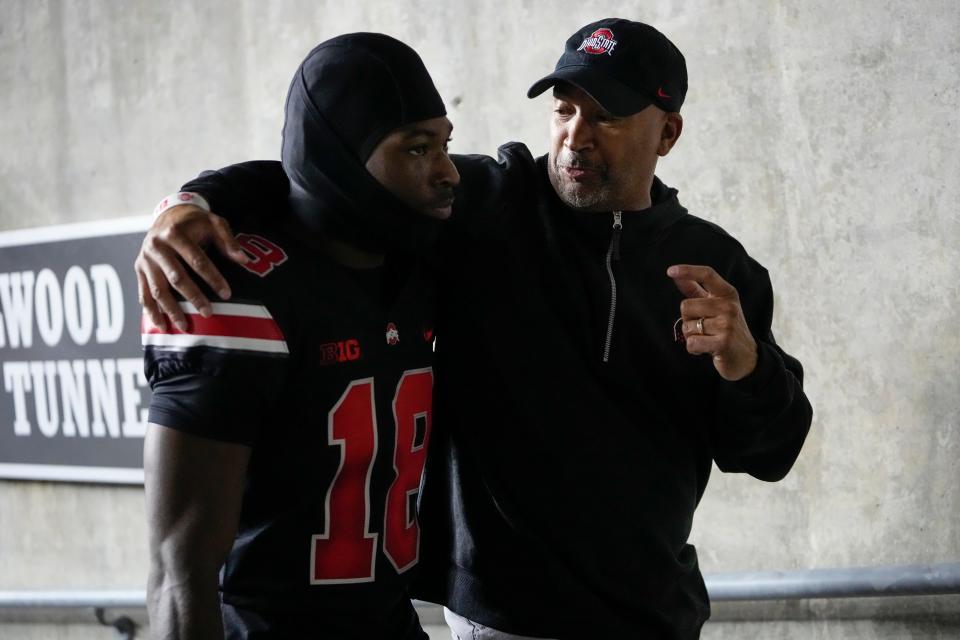 Ohio State's Jyaire Brown, seen here with secondary coach Tim Walton, played 28 snaps against Northwestern, his largest role since the Big Ten opener against Wisconsin.