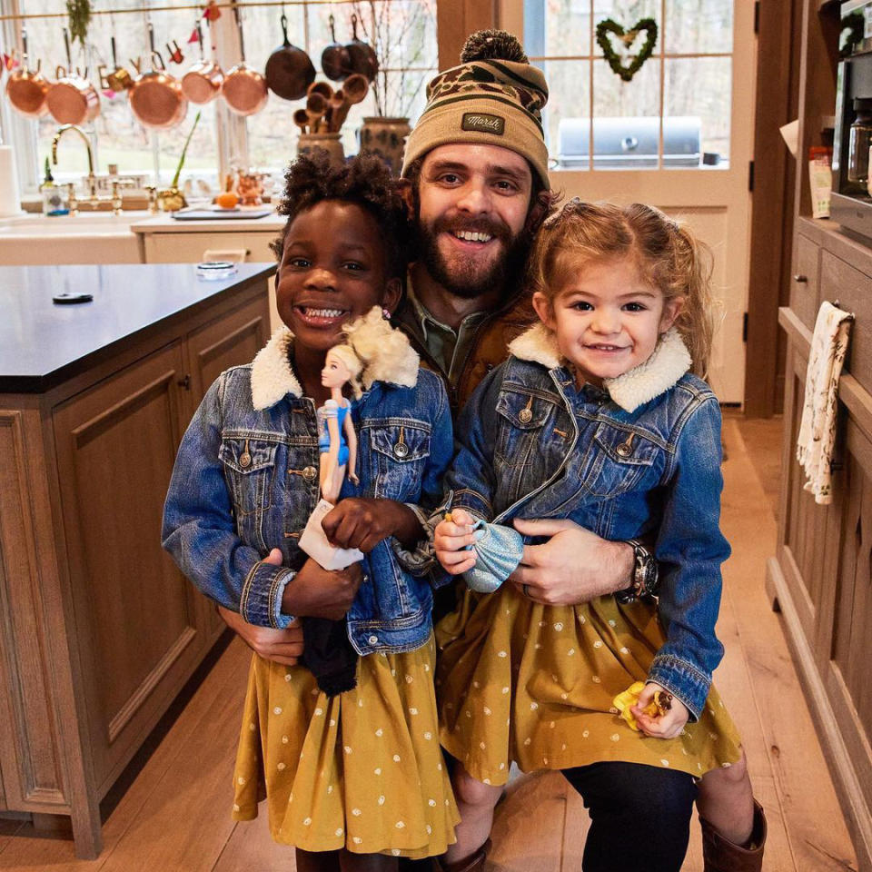 <p>Daddy's girls! The "What's Your Country Song" singer snuggled up to his two oldest girls, Willa Gray, 5, and Ada James, 3 — whom he shares with wife Lauren Akins — who are <a href="https://www.instagram.com/p/CKexgx7BpSN/" rel="nofollow noopener" target="_blank" data-ylk="slk:adorably twinning;elm:context_link;itc:0;sec:content-canvas" class="link ">adorably twinning</a> in matching outfits. The couple also share daughter Lennon Love, 11 months. </p>