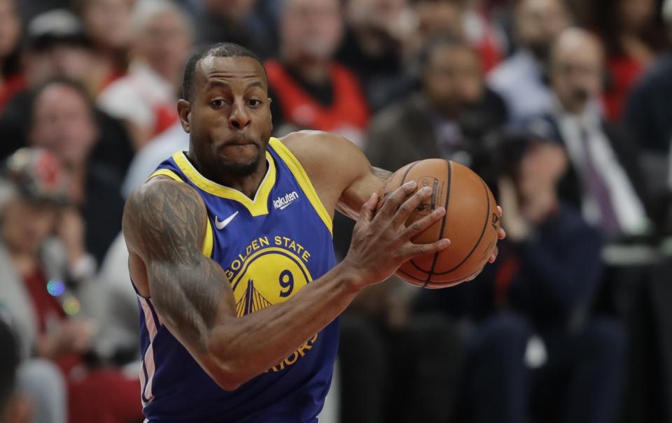 Golden State Warriors guard Andre Iguodala holds the ball during the first half of Game 3 of the NBA basketball playoffs Western Conference finals against the Portland Trail Blazers, Saturday, May 18, 2019, in Portland, Ore. (AP Photo/Ted S. Warren)