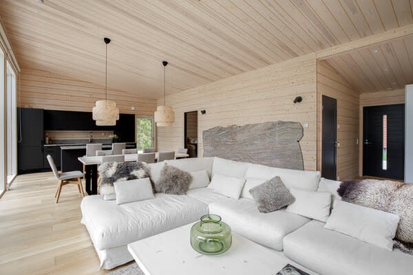 The Scandinavian, sustainable wood used in the construction process is on full display inside.