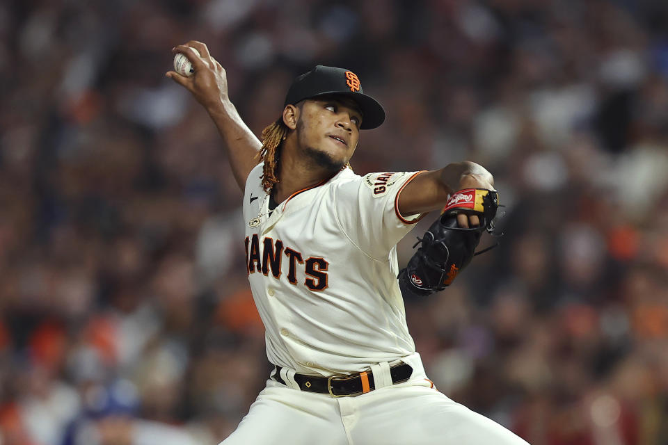 San Francisco Giants' Camilo Doval pitches against the Los Angeles Dodgers during the eighth inning of Game 5 of a baseball National League Division Series Thursday, Oct. 14, 2021, in San Francisco. (AP Photo/John Hefti)