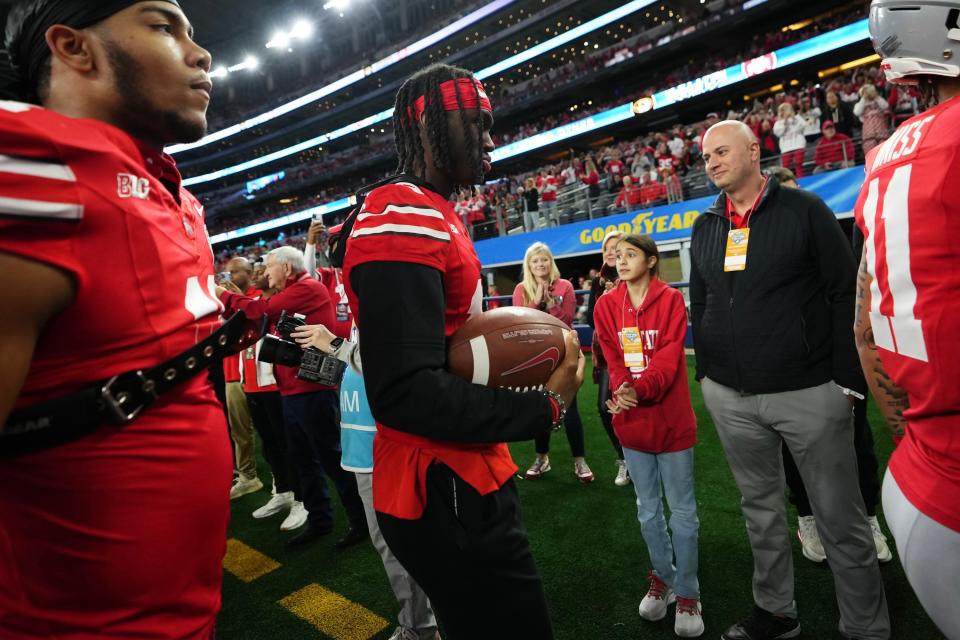 Dec 29, 2023; Arlington, Texas, USA; Ohio State Buckeyes wide receiver Marvin Harrison Jr. (18) walks off the sideline prior to the Goodyear Cotton Bowl Classic against the Missouri Tigers at AT&T Stadium.