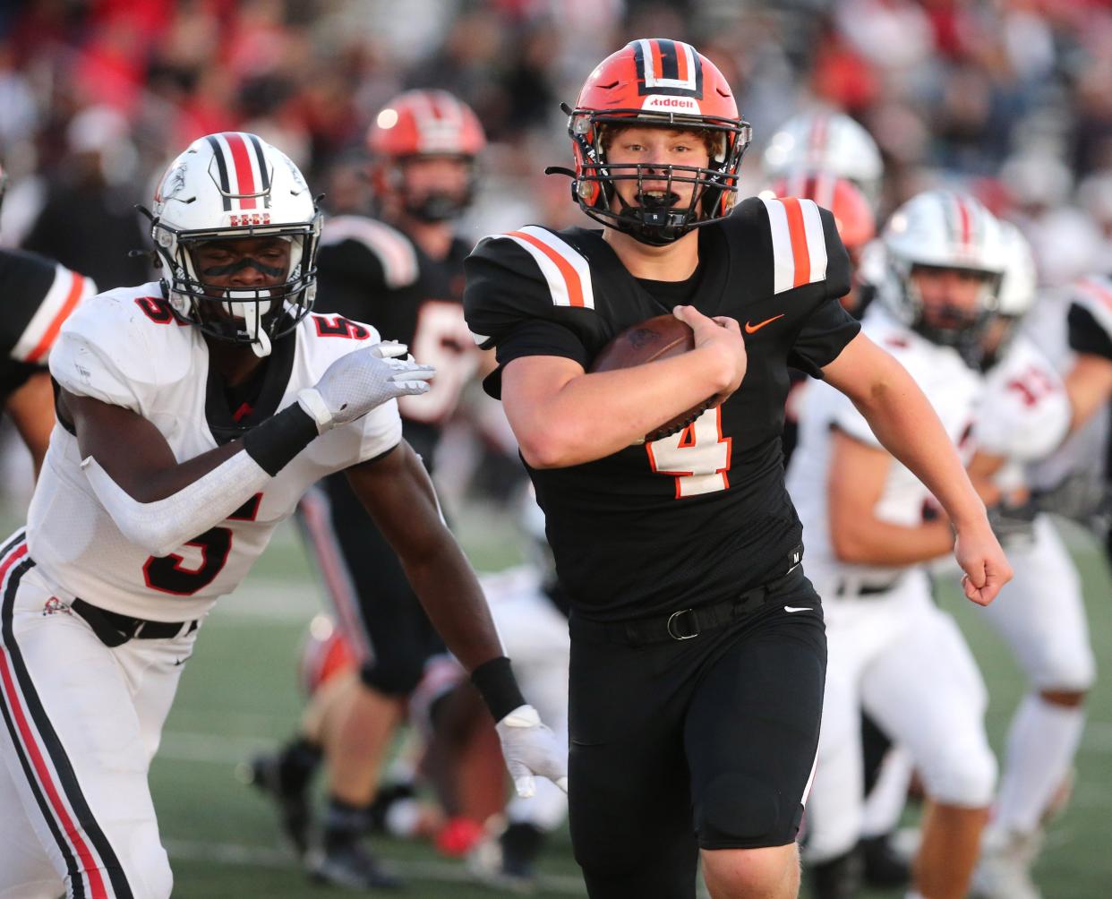 Hoover's Drew Logan runs for a touchdown during their game against McKinley at Hoover on Friday, Sept. 24, 2021.