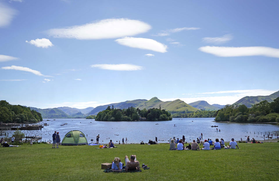 People enjoy the weather at Derwentwater in the Lake District National Park near Keswick. Picture date: Saturday June 5, 2021. (Photo by Owen Humphreys/PA Images via Getty Images)