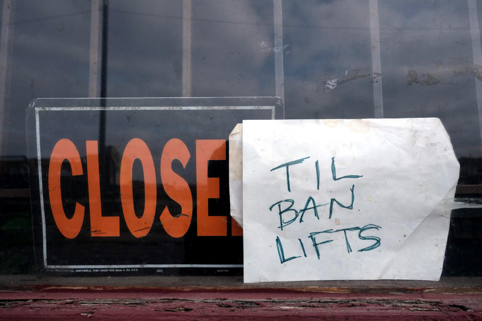 Image: A local business closes until the stay at home order is lifted in Detroit on March 24, 2020. (Seth Herald / AFP - Getty Images file)