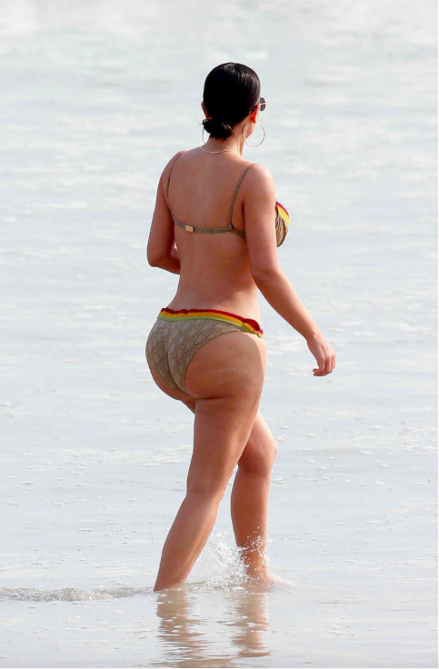 The world was scrutinising Kim Kardashian's unretouched bottom earlier this year [Photo: FlameFlynet]