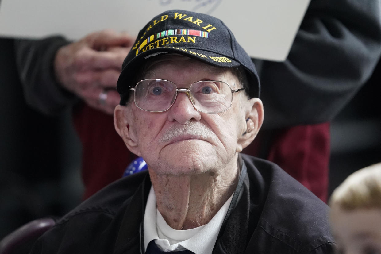 World War II veteran Gordon Wilson, 99, participates in an event celebrating the upcoming 105th birthday of fellow veteran Joseph Eskenazi, who at 104 years and 11 months old is the oldest living veteran to survive the attack on Pearl Harbor, at the National World War II Museum to in New Orleans, Wednesday, Jan. 11, 2023. According to the museum, Wilson served in the Pacific aboard the USS Lexington "The Blue Ghost". Gordon was standing right outside the bridge when it was hit by a kamikaze. He was pulled inside by another sailor just before the hit. He received a Purple Heart. (AP Photo/Gerald Herbert)