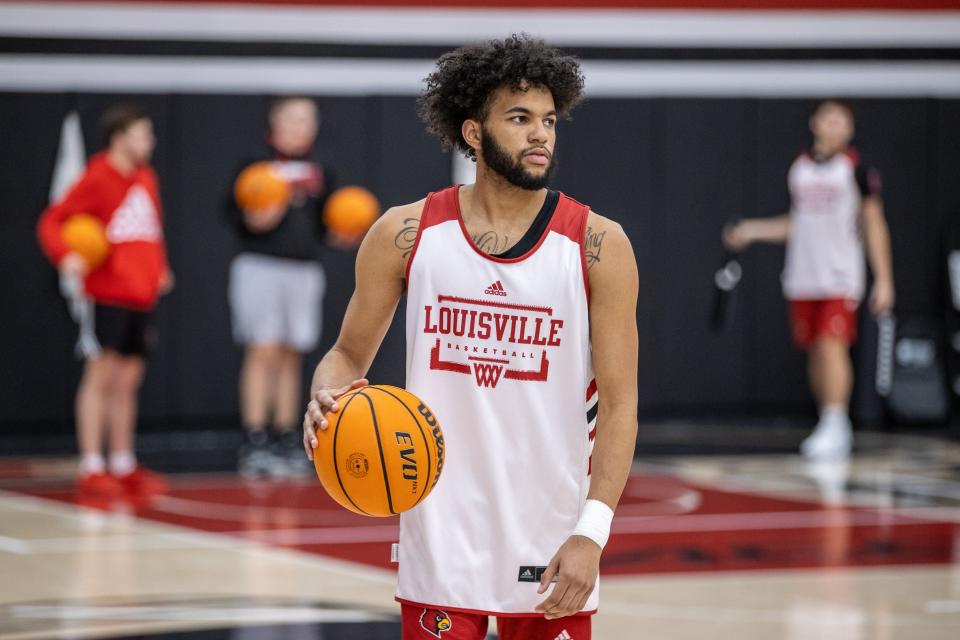 U of L's Ashton Myles-Devore warms up during a U of L basketball practice during Tuesday's Media Day. Oct. 19, 2021