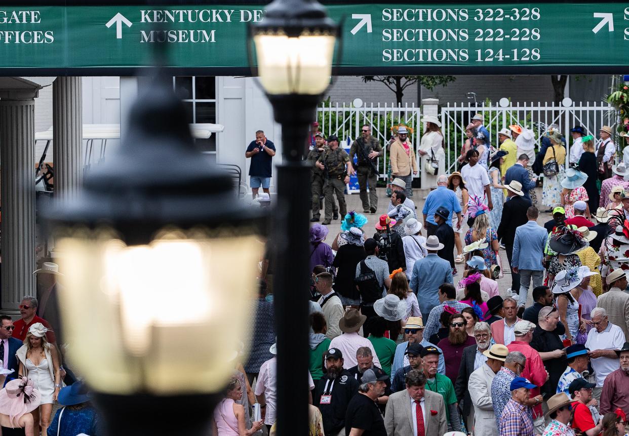 Crowds made their way around the paddock at the 150th Kentucky Derby at Churchill Downs in Louisville, Ky., on Saturday, May 4, 2024.