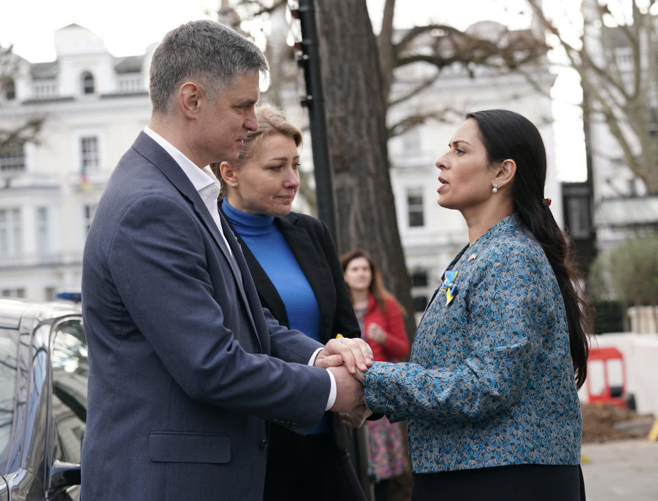 Ambassador of Ukraine to the UK, Vadym Prystaiko and his wife Inna with Home Secretary Priti Patel (right) outside the Ukrainian embassy in London. Picture date: Sunday March 6, 2022.