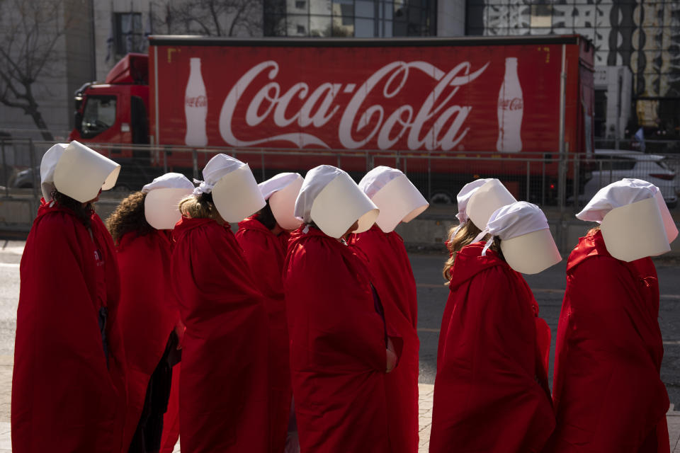 File - Protesters supporting women's rights dressed as characters from The Handmaid's Tale TV series attend a protest against plans by Prime Minister Benjamin Netanyahu's new government to overhaul the judicial system in Tel Aviv, Israel, Monday, Feb. 20, 2023. (AP Photo/Oded Balilty, File)