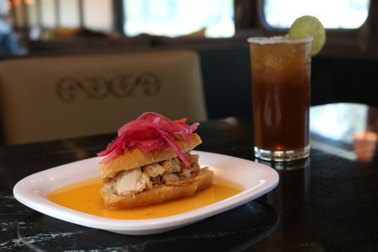 Aboard the train, we ate torta ahogada, a Mexican sandwich filled with fried meat, covered in a savory tomato-based sauce. (Photo: Mundo Cuervo)