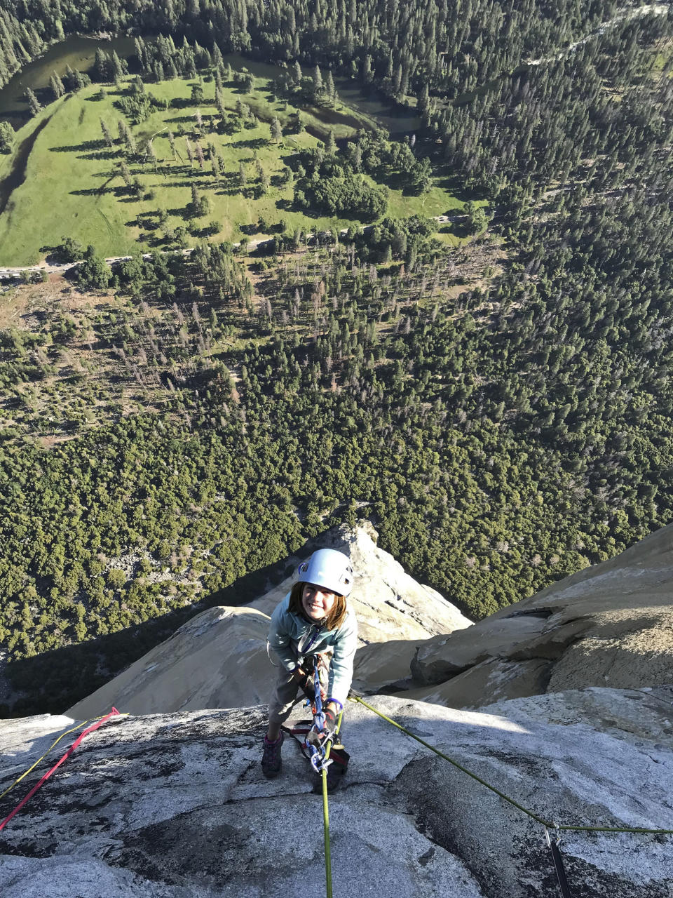 In this June 10, 2019, photo, provided by Michael Schneiter, is Selah Schneiter during her climb up El Capitan in Yosemite National Park, Calif. A 10-year-old Colorado girl has scaled Yosemite National Park's El Capitan, taking five days to reach the top of the iconic rock formation. Selah Schneiter of Glenwood Springs completed the challenging 3,000-foot (910 meters) climb last week with the help of her father and a family friend. (Michael Schneiter via AP)