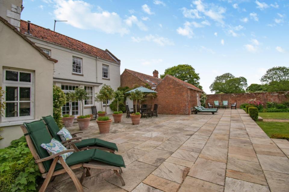 Eastern Daily Press: The extensive sandstone terrace overlooking the walled garden
