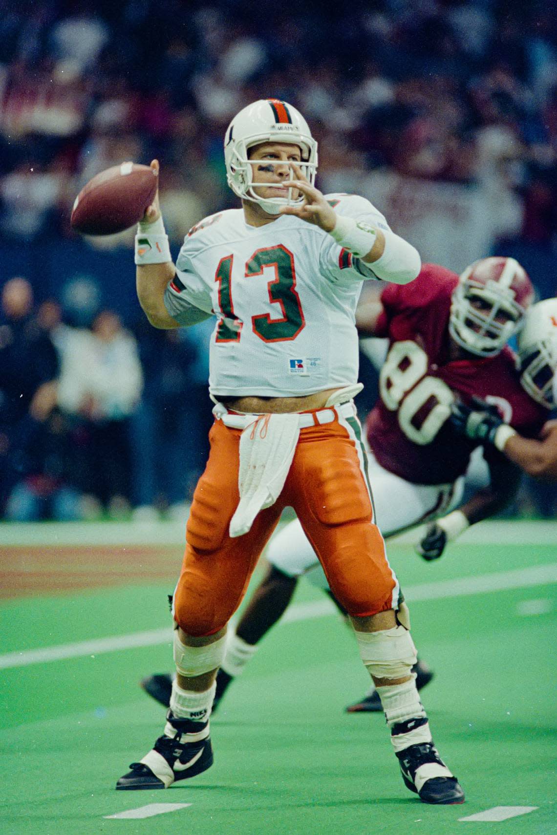 1992 Miami Hurricanes Football: UM quarterback Gino Torretta is shown dropping back to pass in the Jan. 1, 1993 Sugar Bowl.