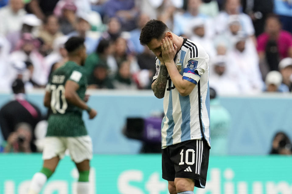 Argentina's Lionel Messi reacts disappointed during the World Cup group C soccer match between Argentina and Saudi Arabia at the Lusail Stadium in Lusail, Qatar, Tuesday, Nov. 22, 2022. (AP Photo/Natacha Pisarenko)