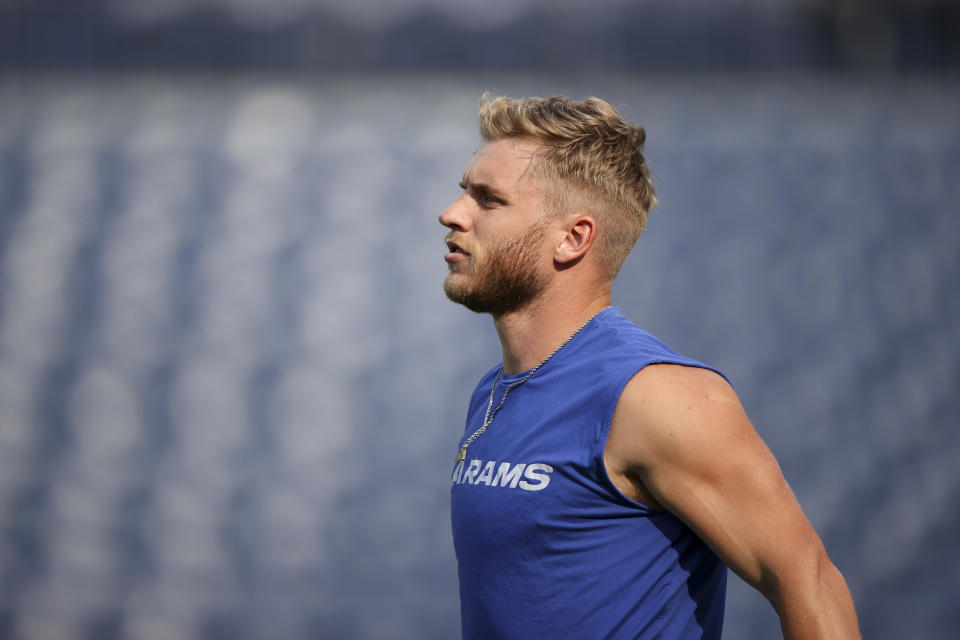 DENVER, COLORADO - AUGUST 26: Cooper Kupp #10 of the Los Angeles Rams warms up before the preseason game against the Denver Broncos at Empower Field At Mile High on August 26, 2023 in Denver, Colorado. (Photo by Tyler Schank/Clarkson Creative/Getty Images)