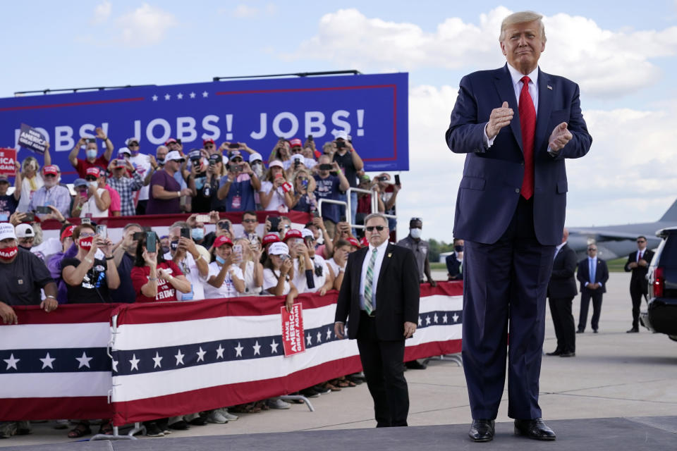 President Donald Trump arrives to speak at a campaign rally at Wittman Airport, Monday, Aug. 17, 2020, in Oshkosh, Wis. (AP Photo/Evan Vucci)