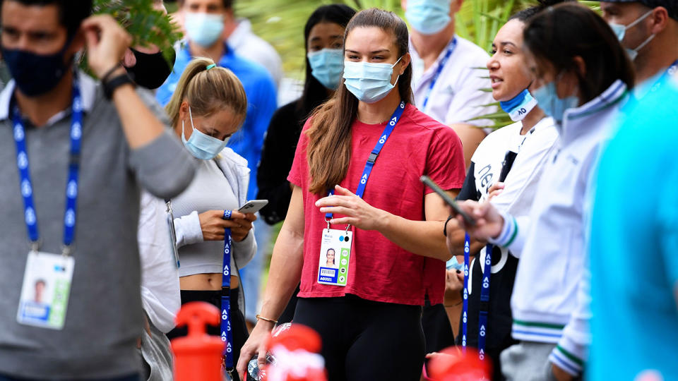 Australian Open players, pictured here waiting for a COVID-19 test in Melbourne.