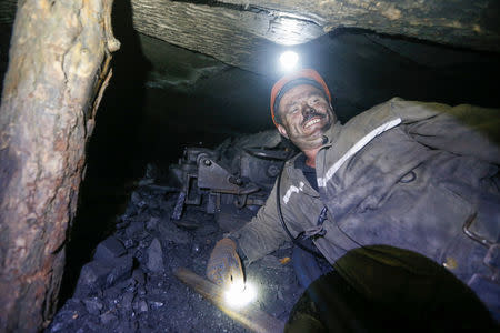 A miner works inside the Novovolynska-9 coal mine in Novovolynsk, Ukraine August 2, 2018. Picture taken August 2, 2018. REUTERS/Valentyn Ogirenko