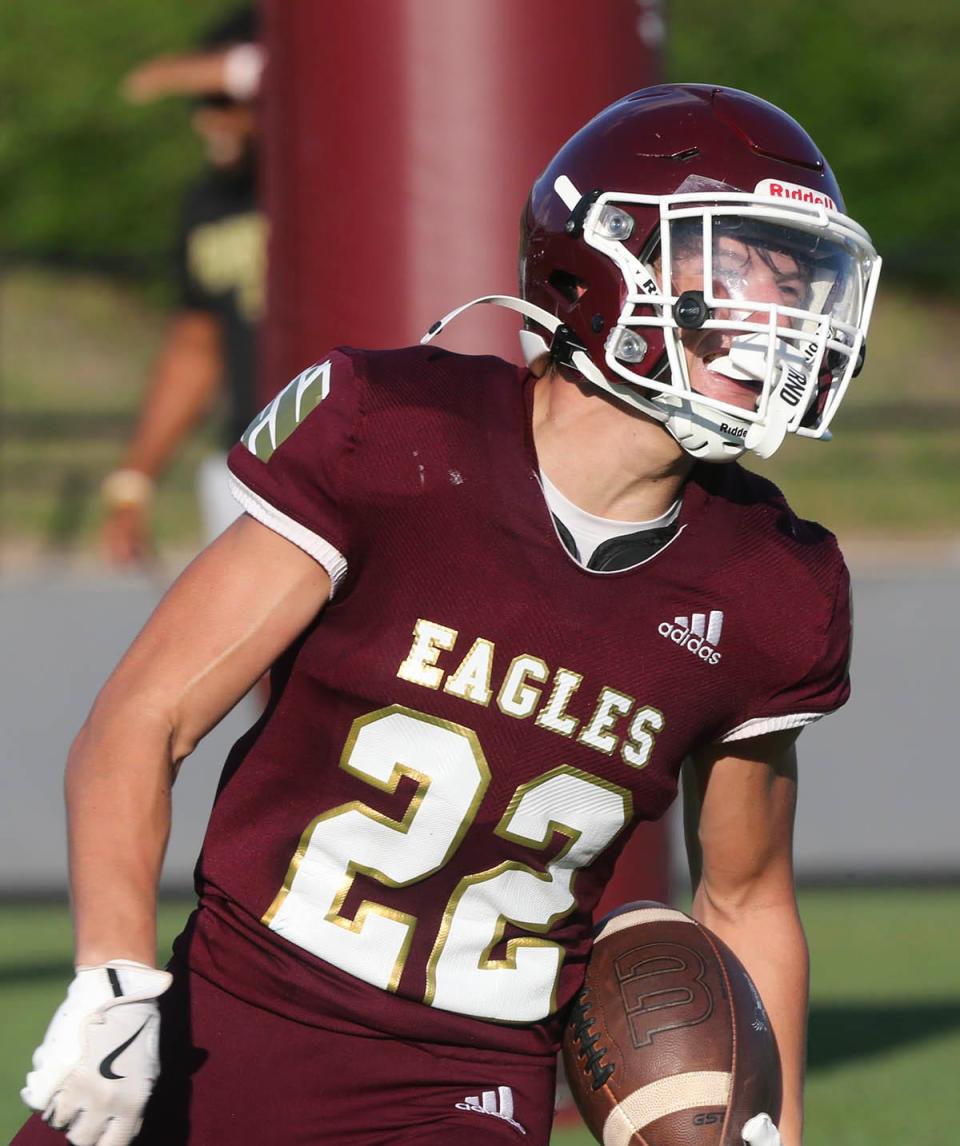 RB Hartley Register celebrates a touchdown during a Niceville Escambia spring football scrimmage at Niceville.