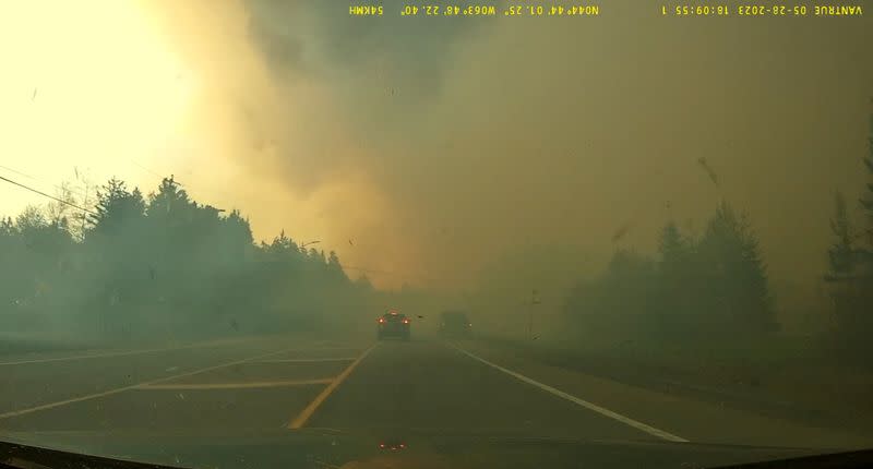 Smoke rises from a wildfire in Hammonds Plains