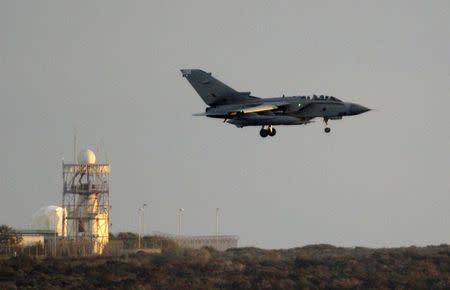 A British Tornado fighter jet lands at the British Royal Air Force's (RAF) Akrotiri base in Cyprus September 28, 2014. Two British fighter jets on a mission to Iraq returned to an air base in Cyprus on Sunday after four hours from take off, but the details of their mission were not immediately clear nor whether the planes had carried out air strikes or surveillance. REUTERS/Andreas Manolis