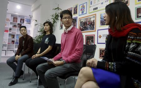 Vietnamese gay rights activist Luong The Huy (2nd R) attends a news conference with transgenders Ngoc Tu (L), Anh Phong (2nd L) and La Lam (R) in Hanoi, Vietnam, November 26, 2015. REUTERS/Kham