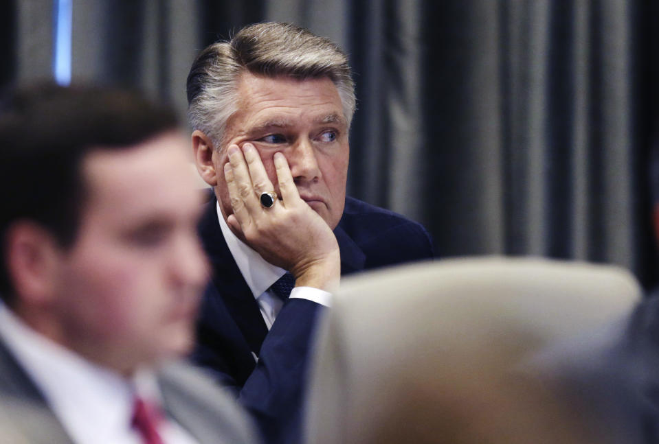 Mark Harris listens during a public evidentiary hearing on the 9th Congressional District investigation at the North Carolina State Bar in Raleigh, N.C., Monday, Feb. 18, 2019. (Juli Leonard/The News & Observer via AP, Pool)