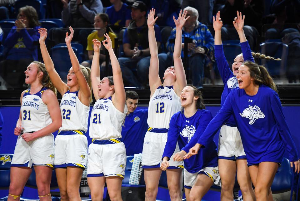 South Dakota State players cheer as the team continues to take a dominating lead in a rivalry matchup against South Dakota on Saturday, January 14, 2023, at Frost Arena in Brookings.