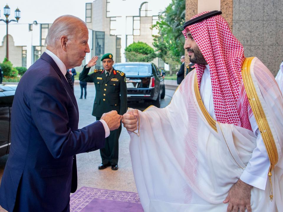 In this image released by the Saudi Royal Palace, Saudi Crown Prince Mohammed bin Salman, right, greets President Joe Biden with a fist bump after his arrival at Al-Salam palace in Jeddah, Saudi Arabia, Friday, July 15, 2022.