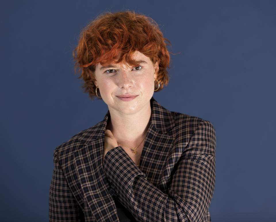 In this June 18, 2019 photo, Jessie Buckley poses for a portrait in New York. In “Wild Rose,” Buckley stars as a fiery, working-class Glasgow single mother, just out of prison, who dreams of becoming a country music star. (Photo by Brian Ach/Invision/AP)