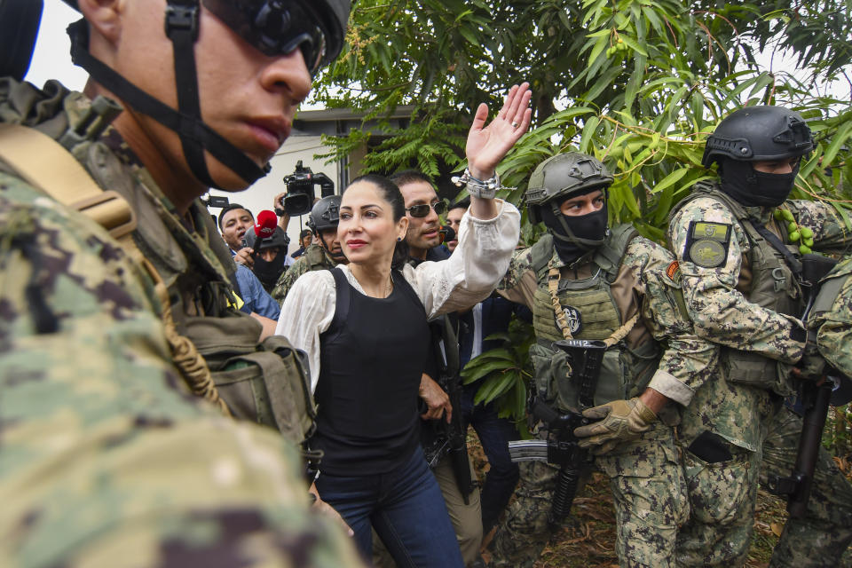 Presidential candidate Luisa Gonzalez, of the Citizen's Revolutionary Movement, arrives to vote in a runoff election in Canuto, Ecuador, Sunday, Oct. 15, 2023. (AP Photo/Ariel Ochoa)