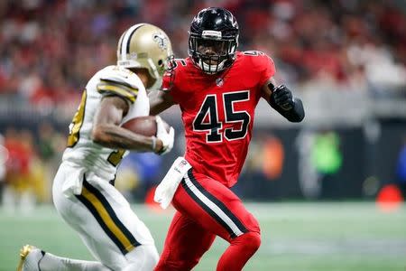 FILE PHOTO: Dec 7, 2017; Atlanta, GA, USA; Atlanta Falcons linebacker Deion Jones (45) tackles New Orleans Saints wide receiver Ted Ginn Jr. (19) in the third quarter at Mercedes-Benz Stadium. Mandatory Credit: Brett Davis-USA TODAY Sports/File Photo