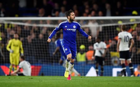 Britain Football Soccer - Chelsea v Tottenham Hotspur - Barclays Premier League - Stamford Bridge - 2/5/16 Chelsea's Cesc Fabregas celebrates their first goal scored by Gary Cahill Reuters / Dylan Martinez Livepic EDITORIAL USE ONLY. No use with unauthorized audio, video, data, fixture lists, club/league logos or "live" services. Online in-match use limited to 45 images, no video emulation. No use in betting, games or single club/league/player publications. Please contact your account representative for further details.