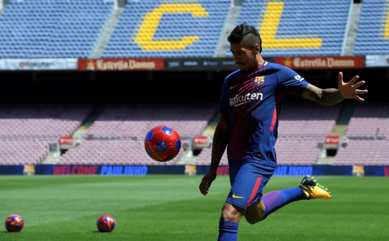 Barcelona's new signing Paulinho Bezerra kicks a ball during his official presentation, at the Camp Nou stadium in Barcelona, on August 17, 2017