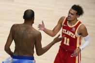 Atlanta Hawks guard Trae Young (11) congratulates Brooklyn Nets forward Kevin Durant (7) after the Nets' win in an NBA basketball game Wednesday, Jan. 27, 2021, in Atlanta. (AP Photo/Brynn Anderson)