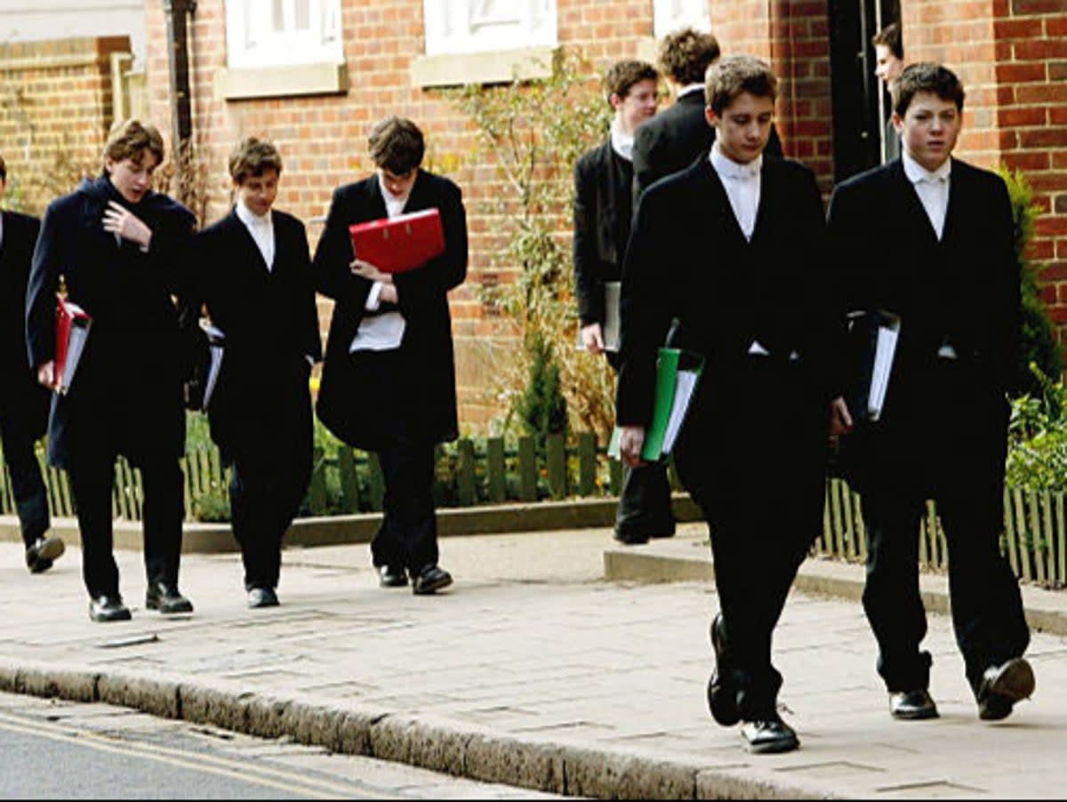 The school uniform consists of tailcoats and starched collars (Getty Images)
