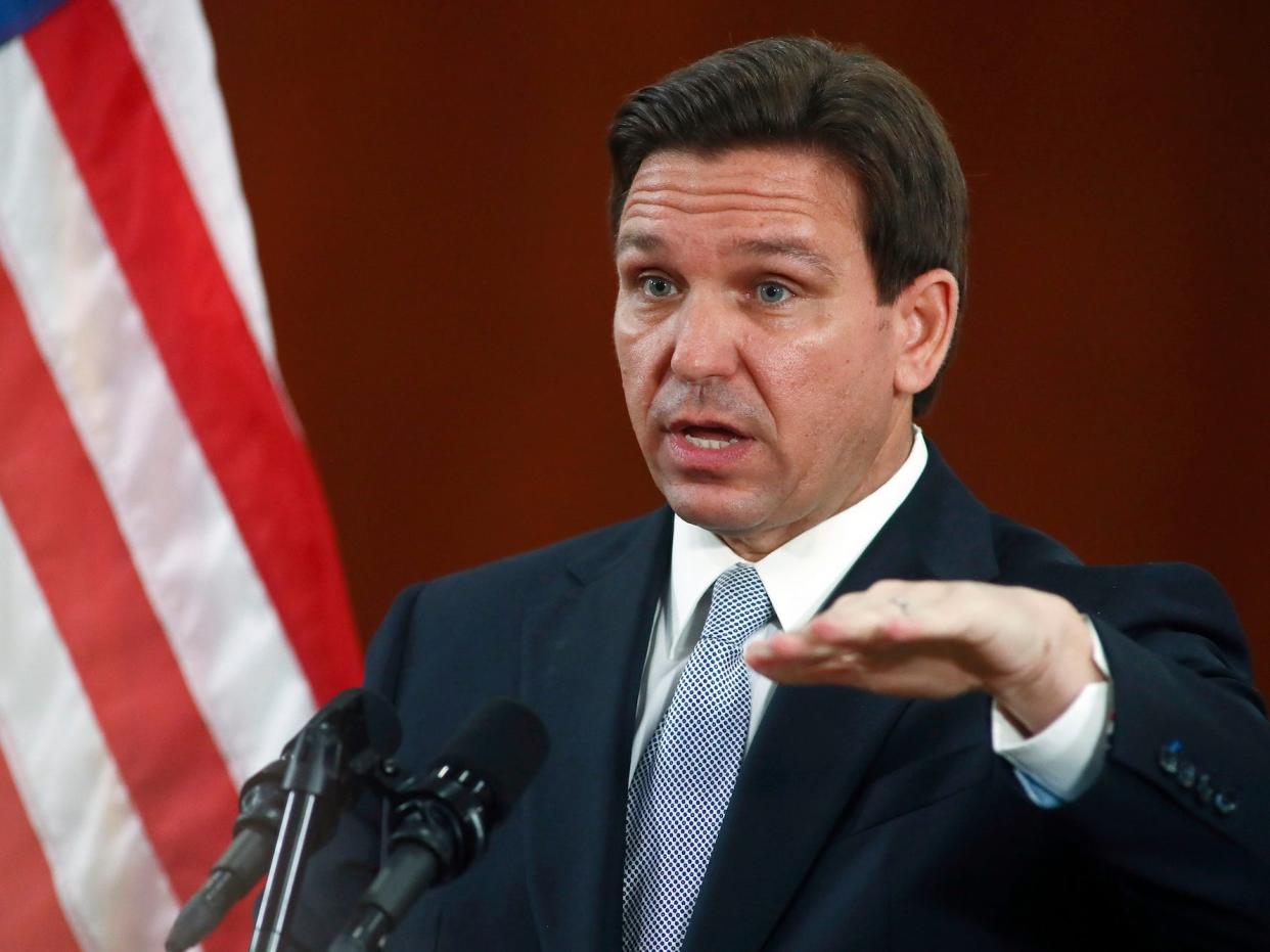 Florida Gov. Ron DeSantis answers questions from the media in the Florida Cabinet following his State of the State address during a joint session of the Senate and House of Representatives Tuesday, March 7, 2023, at the Capitol in Tallahassee, Florida.