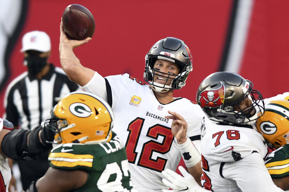 Tampa Bay Buccaneers quarterback Tom Brady (12) throws a pass against the Green Bay Packers during the second half of an NFL football game Sunday, Oct. 18, 2020, in Tampa, Fla. (AP Photo/Jason Behnken)