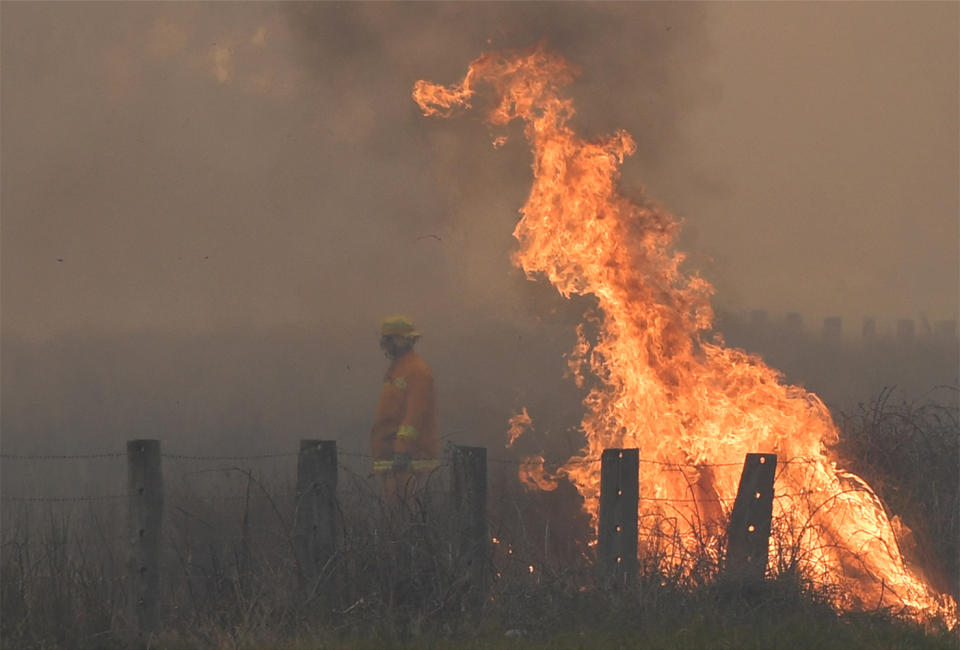 A spot fire is seen close to Garfield – on the Bunyip side of the Princes Highway – hours before Janina was trying to relocate the horses. Source: AAP