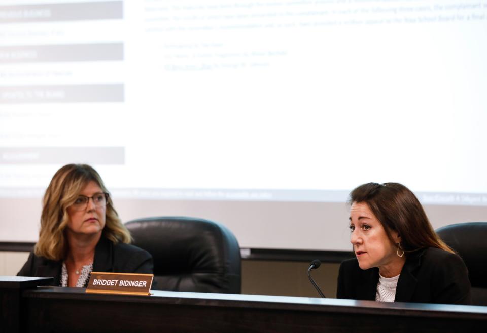 Nixa School Board member Bridget Bidinger listened to parents and students during a May meeting.