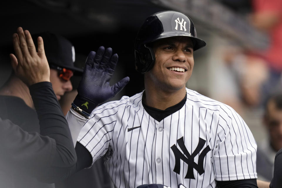 New York Yankees' Juan Soto celebrates with teammates after hitting a home run during the fifth inning of a baseball game against the Chicago White Sox, Saturday, May 18, 2024, in New York. The Yankees won 6-1. (AP Photo/Frank Franklin II)